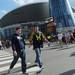 Michigan fans walk past Bridgestone Arena in downtown Nashville, Tenn. on Friday. Michigan is set to take on Ohio University at 7:20 p.m. Melanie Maxwell I AnnArbor.com